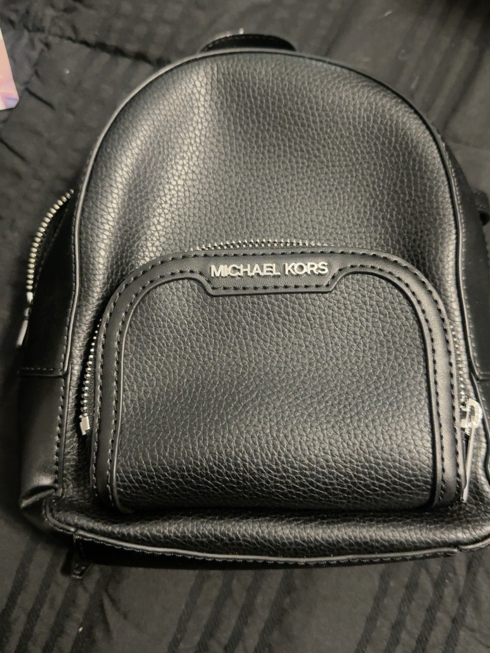 Michael Kors Black Pebbled Mini Backpack with Silver Hardware